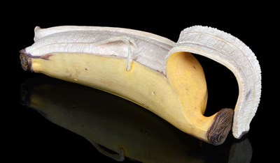 Lot 145 - A JAPANESE IVORY OKIMONO OF A PLANTAIN