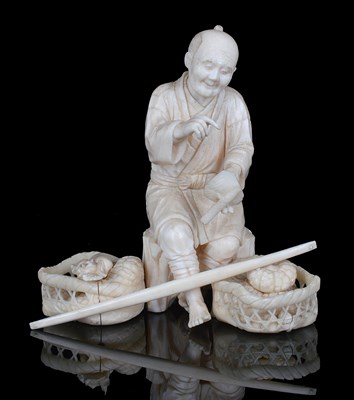 Lot 156 - A JAPANESE IVORY OKIMONO OF A FARMER