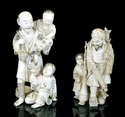 Lot 157 - A JAPANESE IVORY OKIMONO OF A FARMER AND CHILDREN