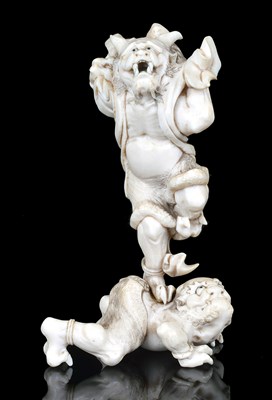 Lot 158 - A JAPANESE IVORY OKIMONO OF ONI