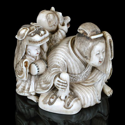 Lot 167 - A JAPANESE IVORY OKIMONO THEATRICAL GROUP