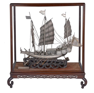 Lot 218 - A CHINESE SILVER MODEL OF A WAR JUNK