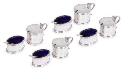 Lot 319 - A SET OF FOUR SILVER MUSTARD POTS AND FOUR SALT CELLARS