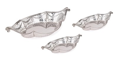 Lot 323 - A SET OF THREE EDWARDIAN SILVER DISHES IN SIZES