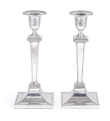 Lot 374 - A PAIR OF GEORGE V SILVER CANDLESTICKS