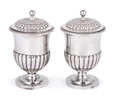 Lot 377 - A PAIR OF INDIAN COLONIAL SILVER PEPPERETTES