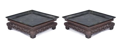 Lot 84 - A PAIR OF CHINESE NEPHRITE LOZENGE SHAPED DISHES ON WOOD STANDS