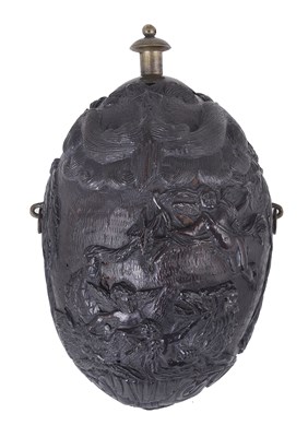 Lot 132 - A CARVED COCONUT 'BUGBEAR' FLASK