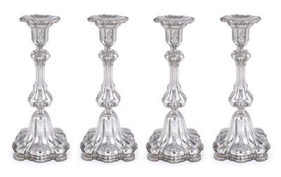 Lot 162 - A SET OF FOUR GERMAN SILVER CANDLESTICKS
