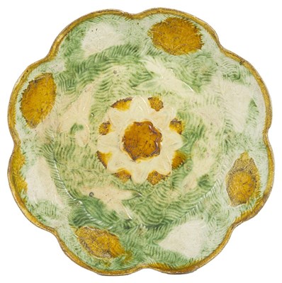 Lot 23 - A MOULDED SANCAI-GLAZED POTTERY DISH