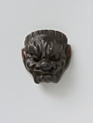 Lot 51 - A JAPANESE MASK NETSUKE OF KONRON