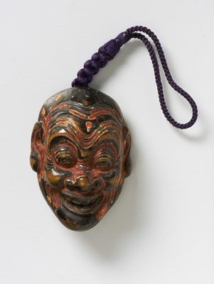Lot 58 - A JAPANESE MASK NETSUKE OF HEISHITORI