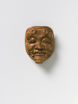 Lot 65 - A JAPANESE MASK NETSUKE OF OKINA