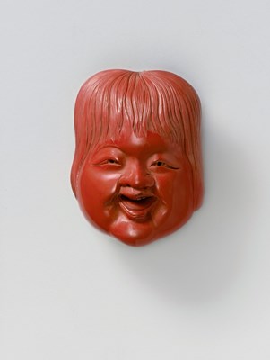 Lot 67 - A JAPANESE MASK NETSUKE OF SHOJO