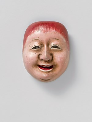Lot 68 - A JAPANESE MASK NETSUKE OF SHOJO