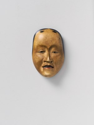 Lot 73 - A JAPANESE MASK NETSUKE OF MIGAKI-ONNA OR HAKAKIME