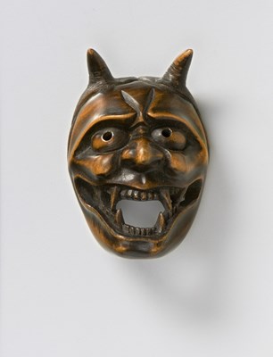 Lot 79 - A JAPANESE MASK NETSUKE OF JA