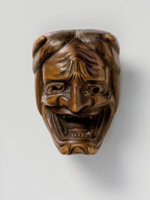 Lot 81 - A JAPANESE MASK NETSUKE OF NAMANARI