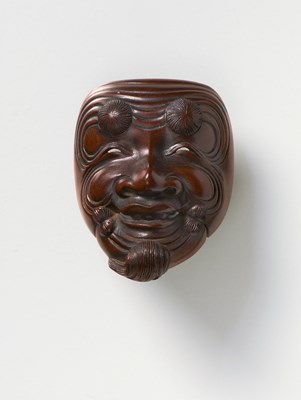Lot 87 - A JAPANESE MASK NETSUKE OF OKINA
