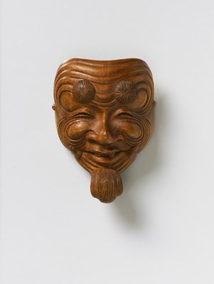 Lot 88 - A JAPANESE MASK NETSUKE OF OKINA