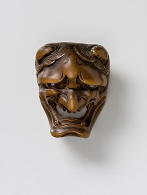 Lot 92 - A JAPANESE MASK NETSUKE OF NAMANARI