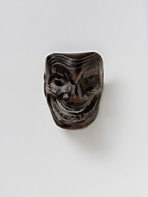 Lot 98 - A JAPANESE MASK NETSUKE OF AKUJO