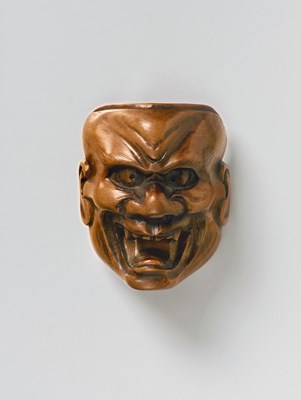 Lot 103 - A JAPANESE MASK NETSUKE OF SHIKAMI