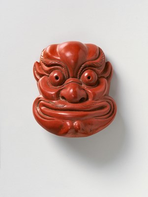 Lot 105 - A JAPANESE MASK NETSUKE OF SARU-BESHIMI