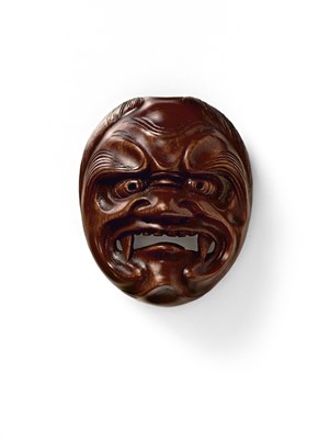 Lot 109 - A JAPANESE MASK NETSUKE OF SHIKAMI