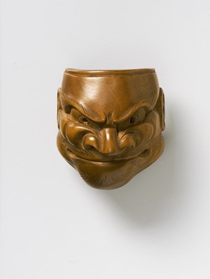 Lot 111 - A JAPANESE MASK NETSUKE OF BESHIMI