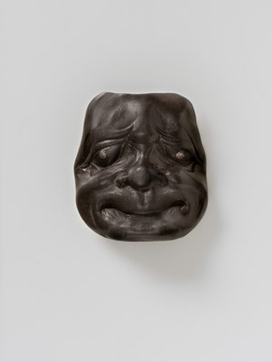 Lot 112 - A JAPANESE MASK NETSUKE OF BESHIMI