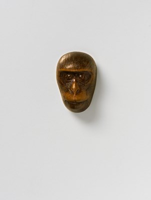 Lot 124 - A JAPANESE MASK NETSUKE OF A SMALL SARU