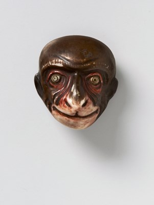 Lot 125 - A JAPANESE MASK NETSUKE OF SARU
