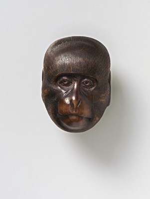 Lot 127 - A JAPANESE MASK NETSUKE OF SARU