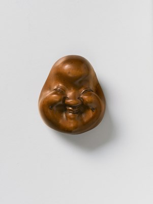 Lot 134 - A JAPANESE MASK NETSUKE OF OTO
