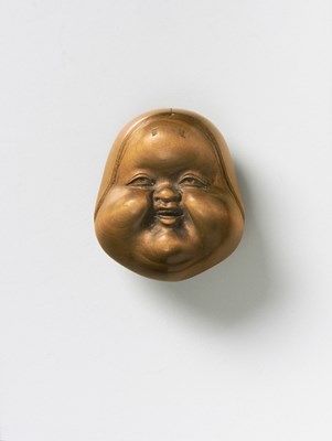 Lot 135 - A JAPANESE MASK NETSUKE OF OTO
