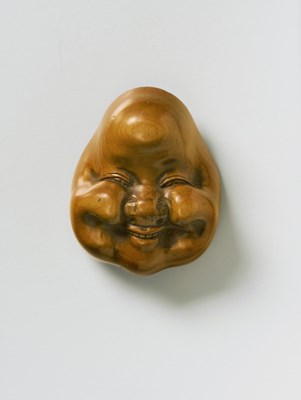 Lot 136 - A JAPANESE MASK NETSUKE OF OTO