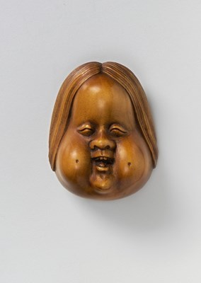 Lot 138 - A JAPANESE MASK NETSUKE OF OTO