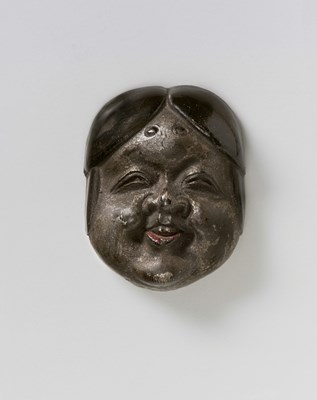 Lot 145 - A JAPANESE MASK NETSUKE OF OKAME