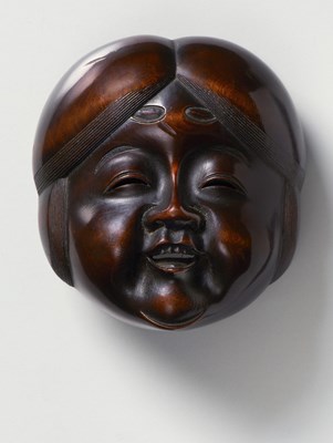 Lot 155 - A JAPANESE MASK NETSUKE OF A LARGE OKAME