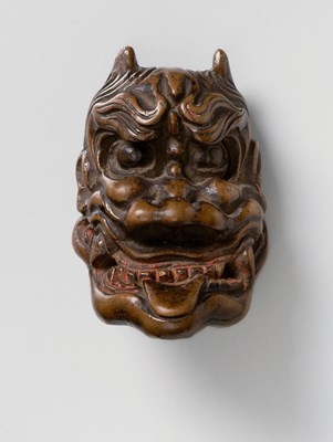Lot 156 - A JAPANESE MASK NETSUKE OF A LARGE ONI