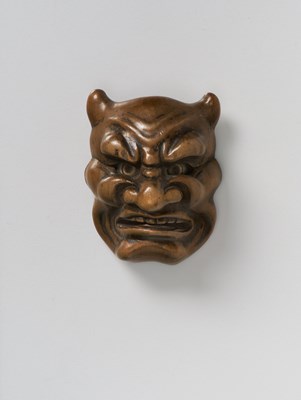 Lot 157 - A JAPANESE MASK NETSUKE OF ONI
