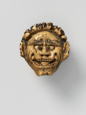 Lot 161 - A JAPANESE MASK NETSUKE OF ONI