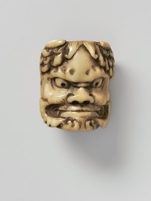 Lot 163 - A JAPANESE MASK NETSUKE OF ONI