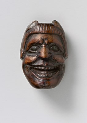 Lot 165 - A JAPANESE MASK NETSUKE OF ONI