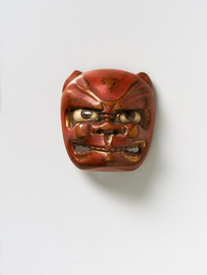 Lot 171 - A JAPANESE MASK NETSUKE OF A DEMON