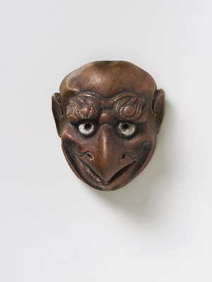 Lot 175 - A JAPANESE MASK NETSUKE OF KARASU-TENGU