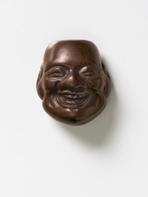 Lot 186 - A JAPANESE MASK NETSUKE OF DAIKOKU