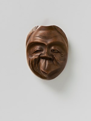 Lot 190 - A JAPANESE MASK NETSUKE OF USOBUKI