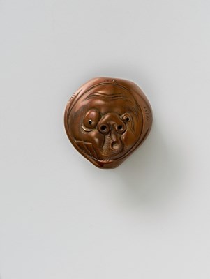 Lot 192 - A JAPANESE MASK NETSUKE OF USOBUKI